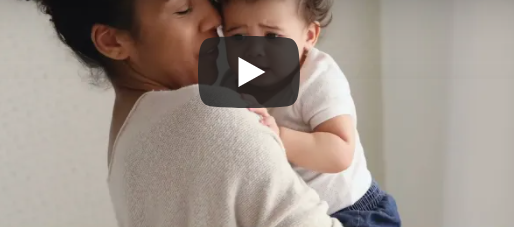 Image of a mother holding her infant child