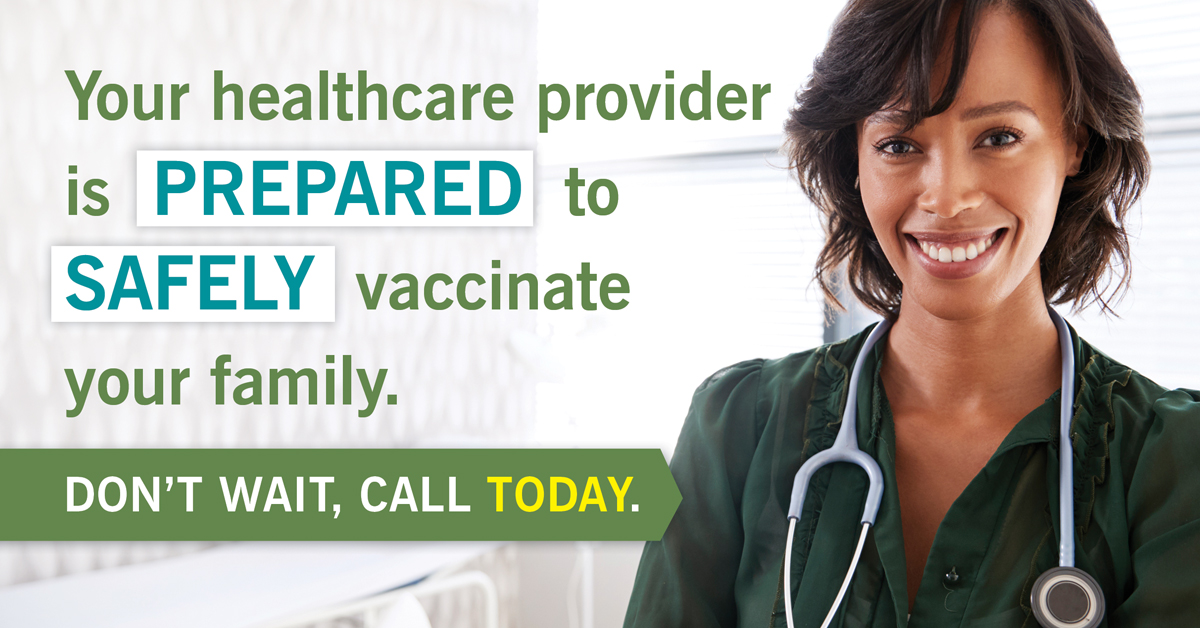 A female healthcare professional wearing a green shirt smiles and has a stethoscope around her neck.  