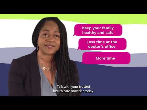 Image of a black woman doctor wearing a black blazer and a blue shirt