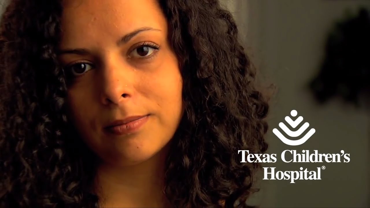 A close-up image of a young woman's face.