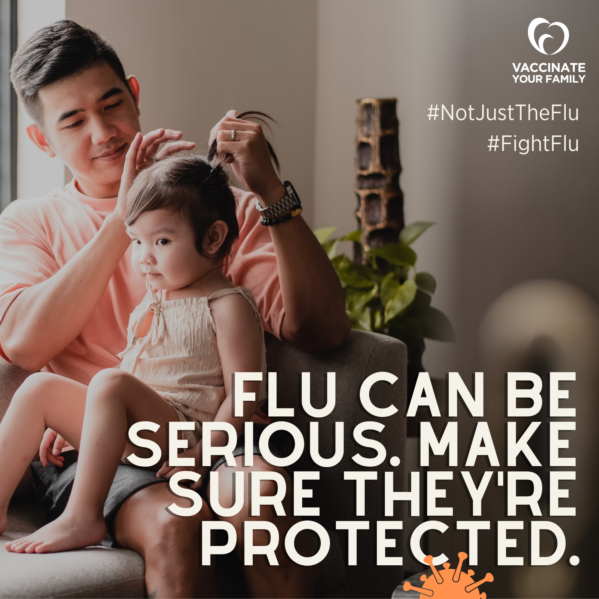 an man combs his baby's hair 