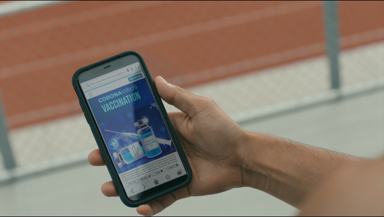 hand holding a phone