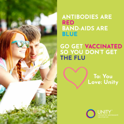 Two teenagers lay outside in the grass. Text reads, "Antibodies are red, band-aids are blue. Go get vaccinated so you don't get the flu. To: You From: Unity"
