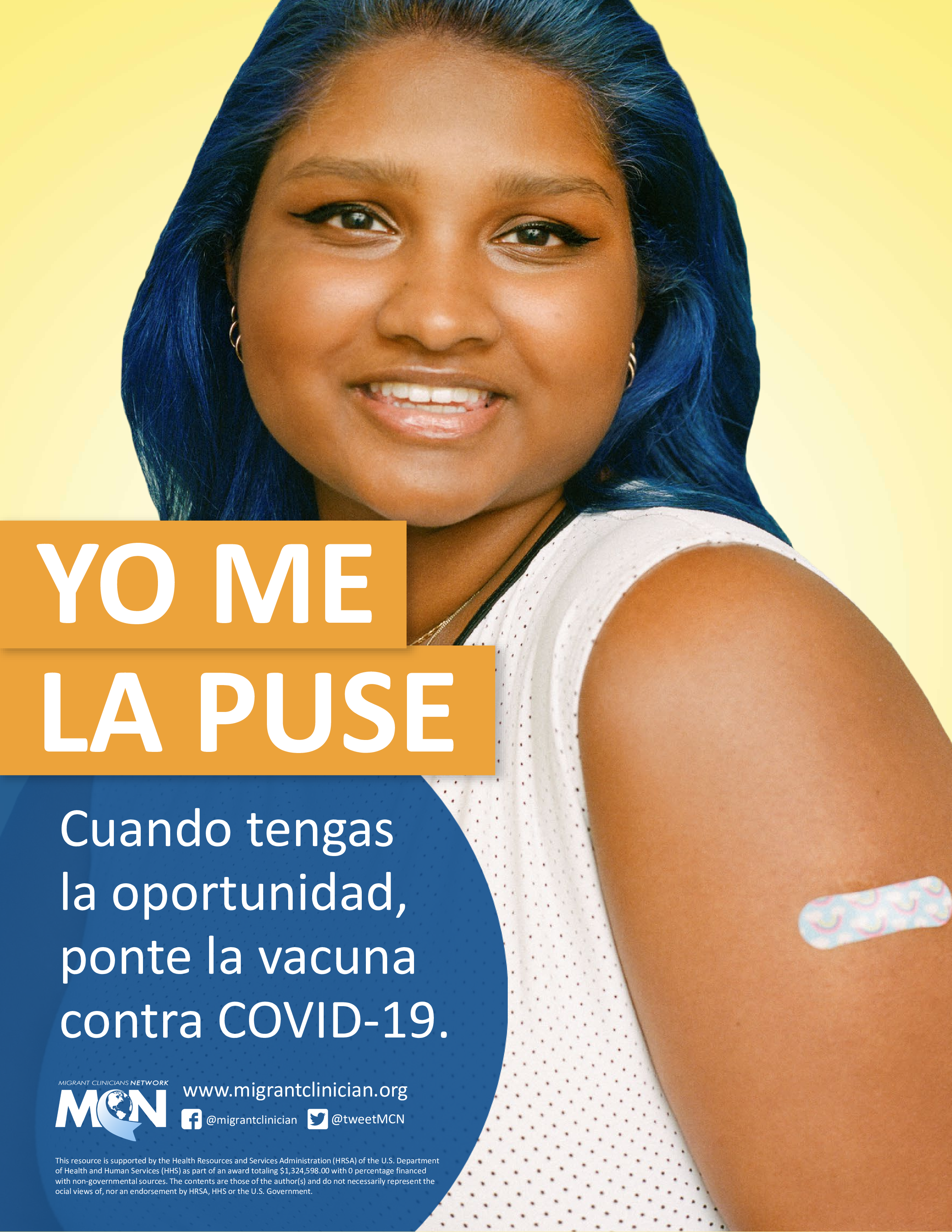 Young woman of color smiles and shows off her vaccination.