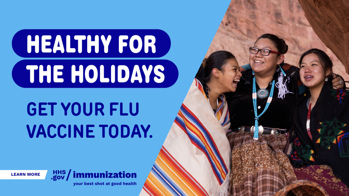 Three Native American women embrace and smile. Text reads, "Healthy for the holidays. Get your flu vaccine today."