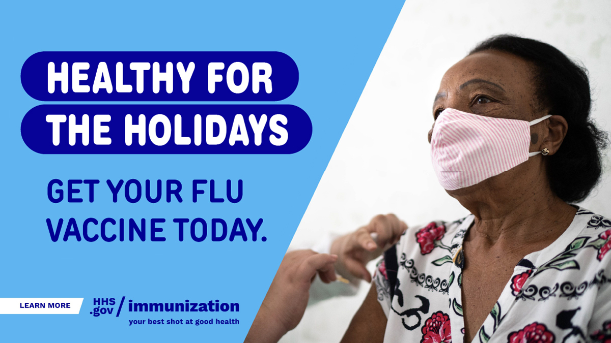 An older Black woman wears a mask and is getting vaccinated. Text reads, "Healthy for the holidays. Get your flu vaccine today."