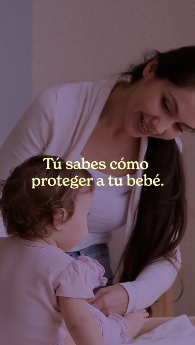 Video shows clips of parents playing with their young children. The overlaying text reads "You know how to protect your baby. You’ve been doing it since day one. Vaccines are one more way to keep them safe. The American Academy of Pediatrics recommends the COVID-19 vaccine for all kids 6 to 23 months old. They’re at high risk for serious illness. Talk to your doctor to learn more."