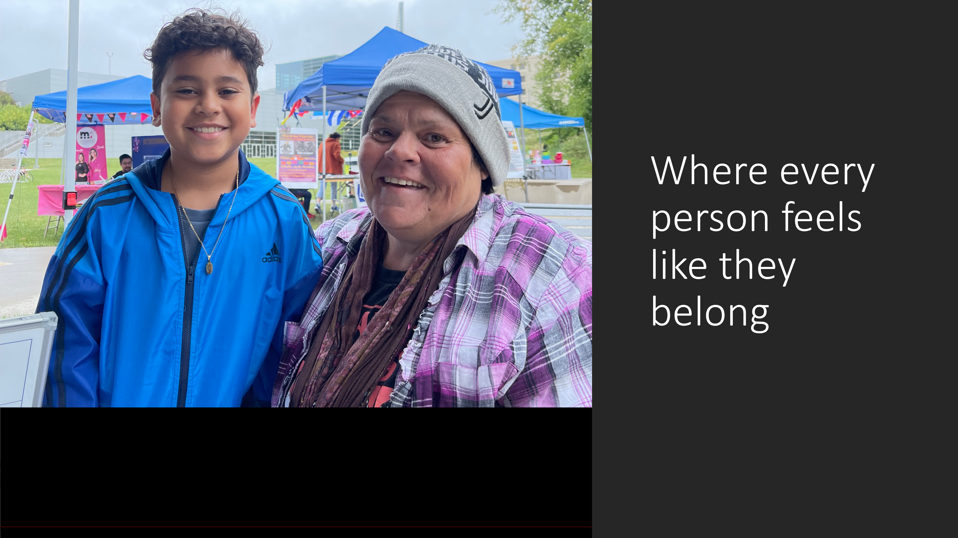 young boy and older woman smiling