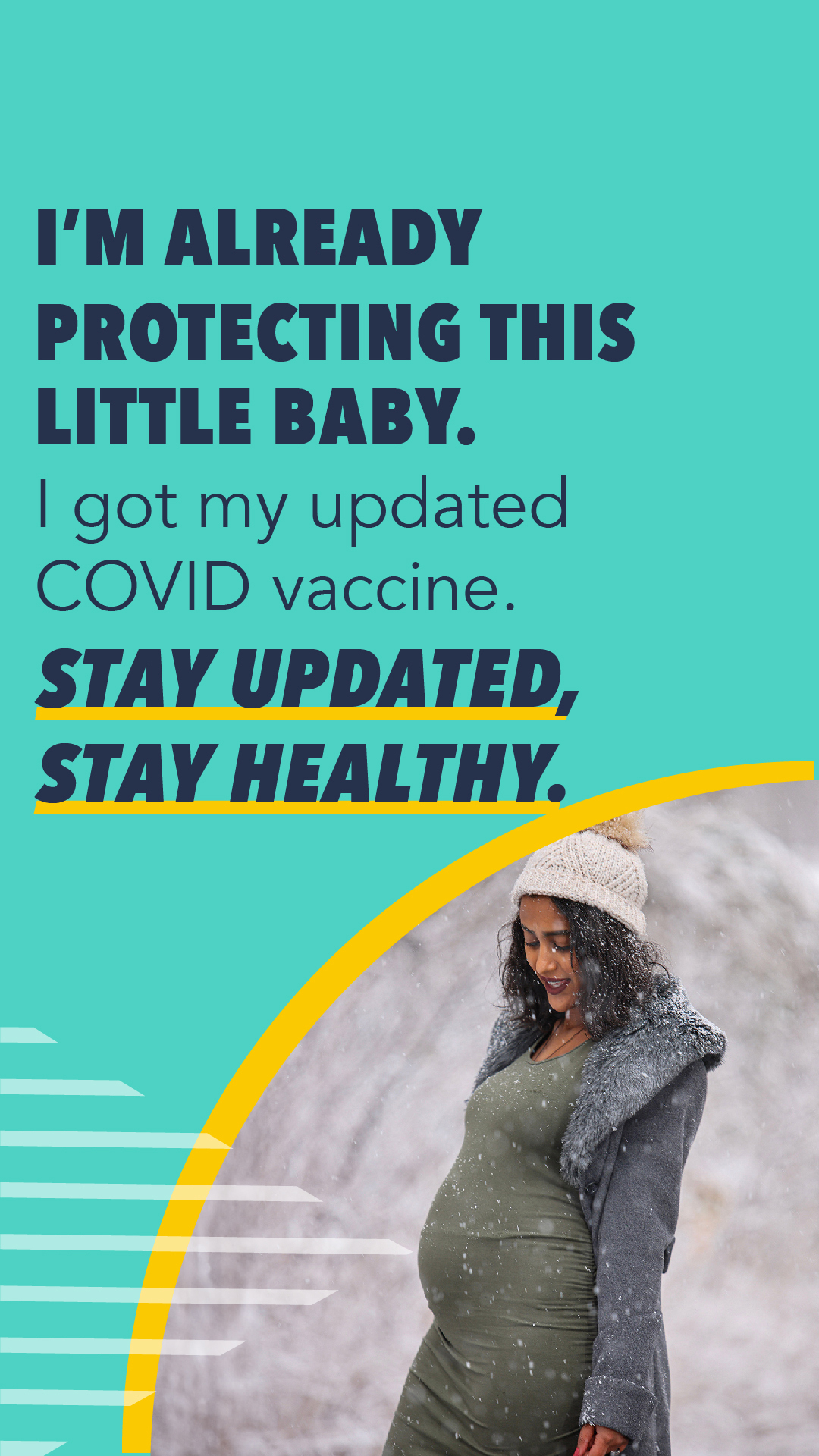 A pregnant woman stands outside on a snowy day and smiles