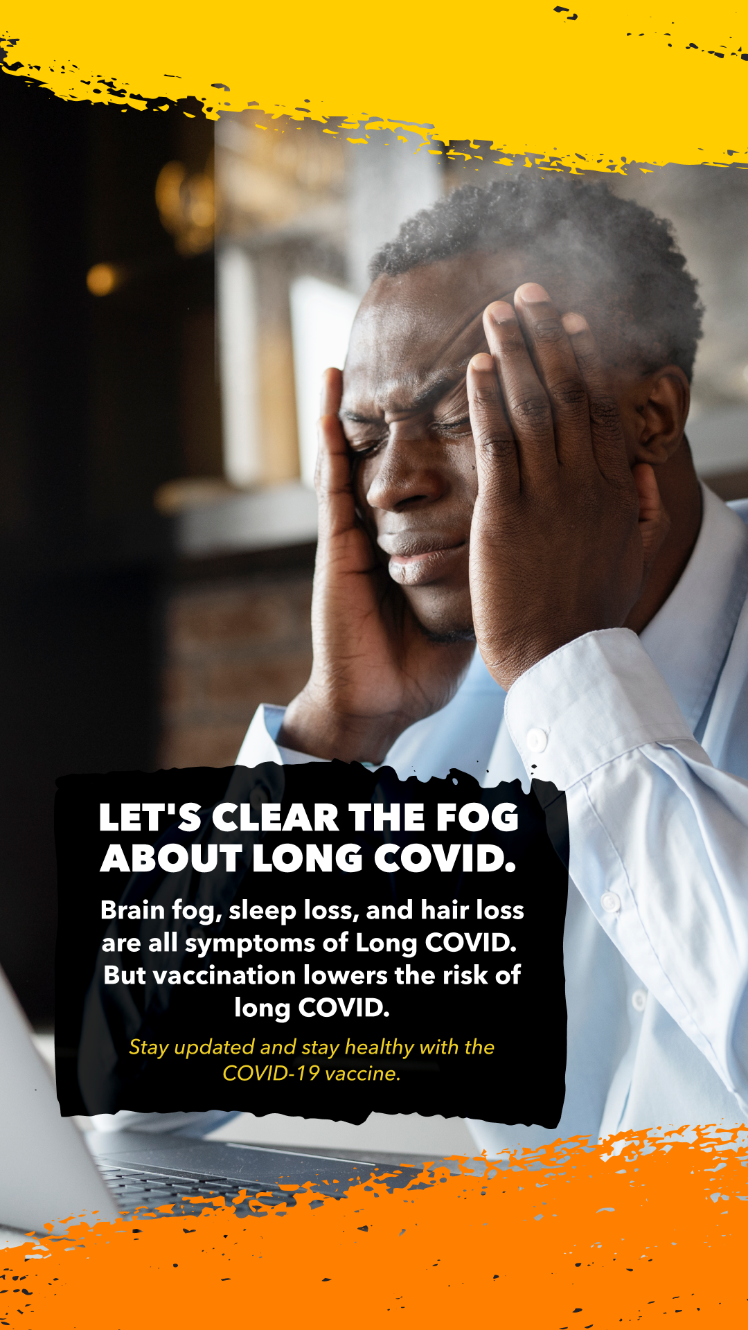 A Black man looks uncomfortable as he rubs his temples.