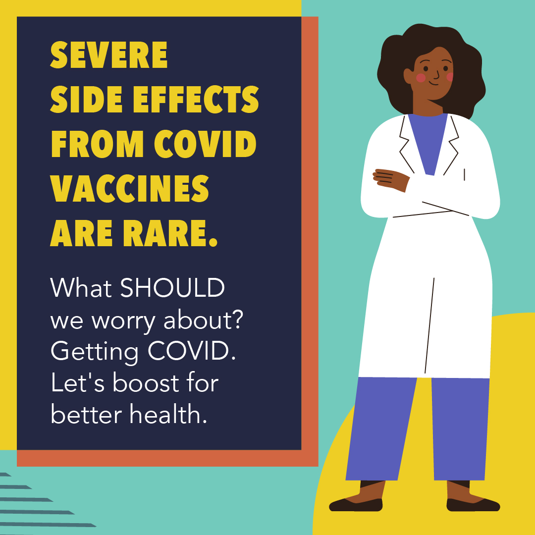 A female doctor of color stands smiling with her arms crossed, in a white lab coat.