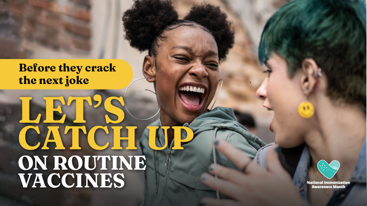 Image of a laughing black teenage girl and talking to a smiling white teenager.