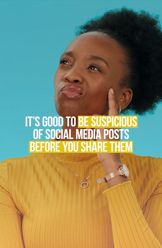 Image contains a black woman in a turtleneck shirt looking like she is contemplating an idea.