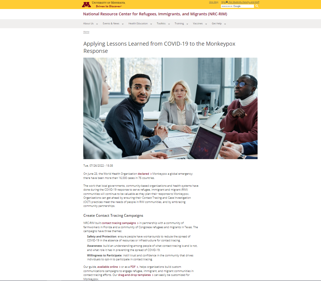 Webpage shows photo of four people sitting at a table and working. Below it is multiple paragraphs of text.