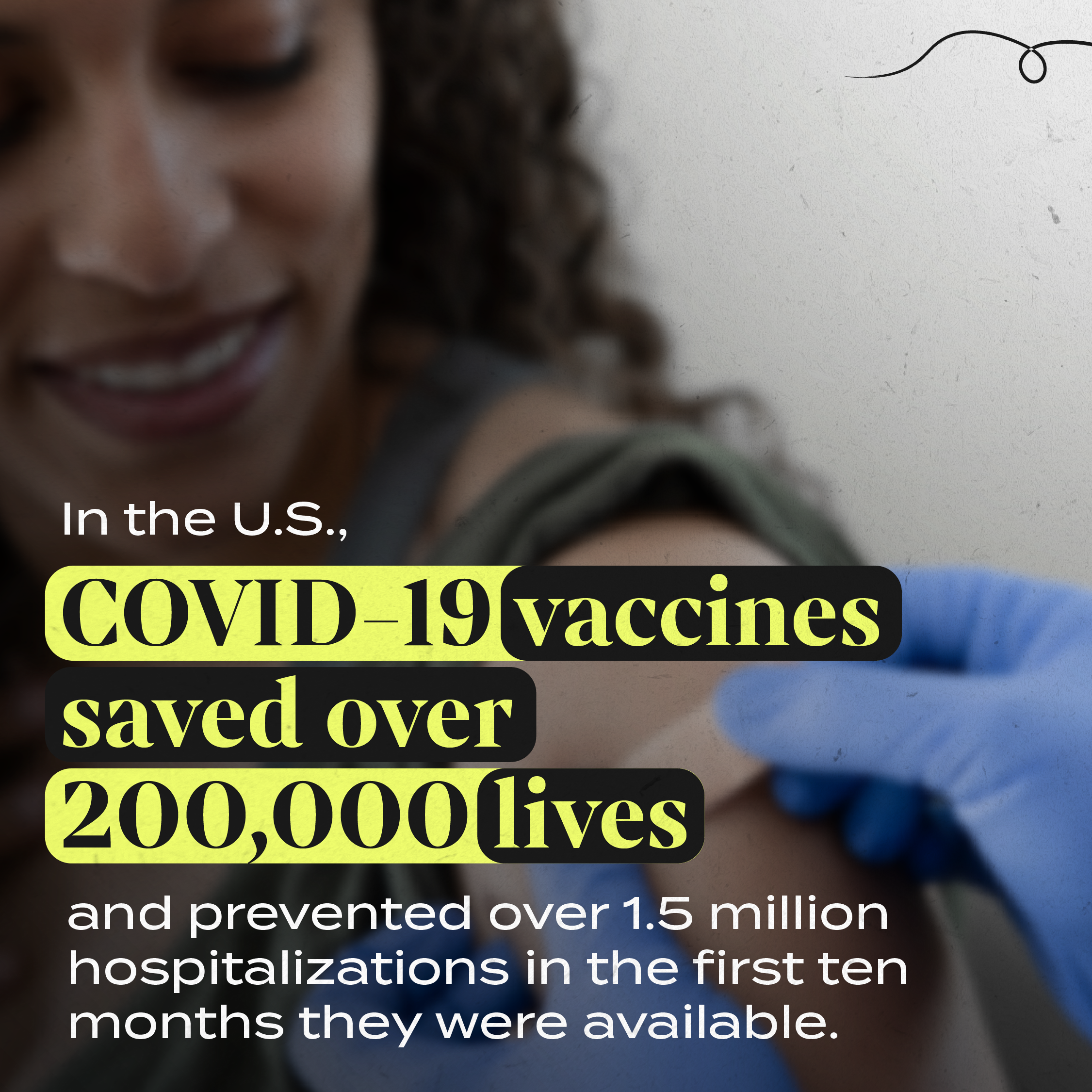 Closeup photo shows a woman smiling as a health provider puts a band aid on her shoulder