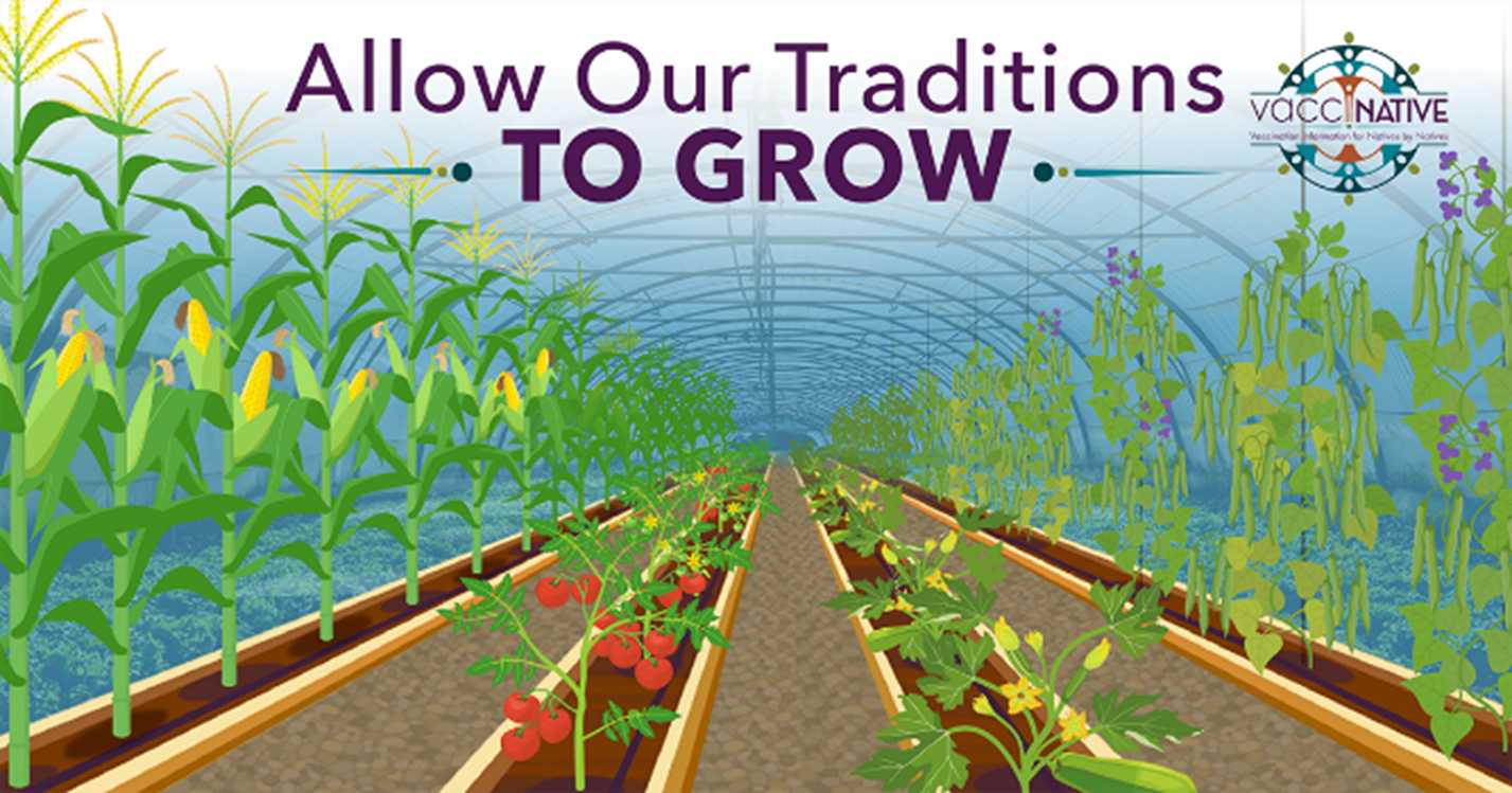 A greenhouse with tomatoes, corn and other vegetables in full bloom.