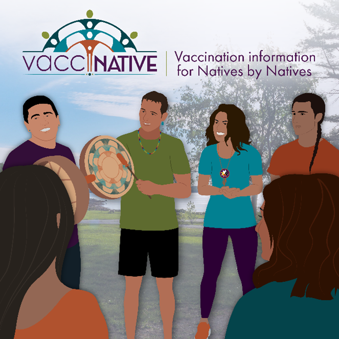 A group of smiling Native people stand in a circle outside, while two of them play the drums.