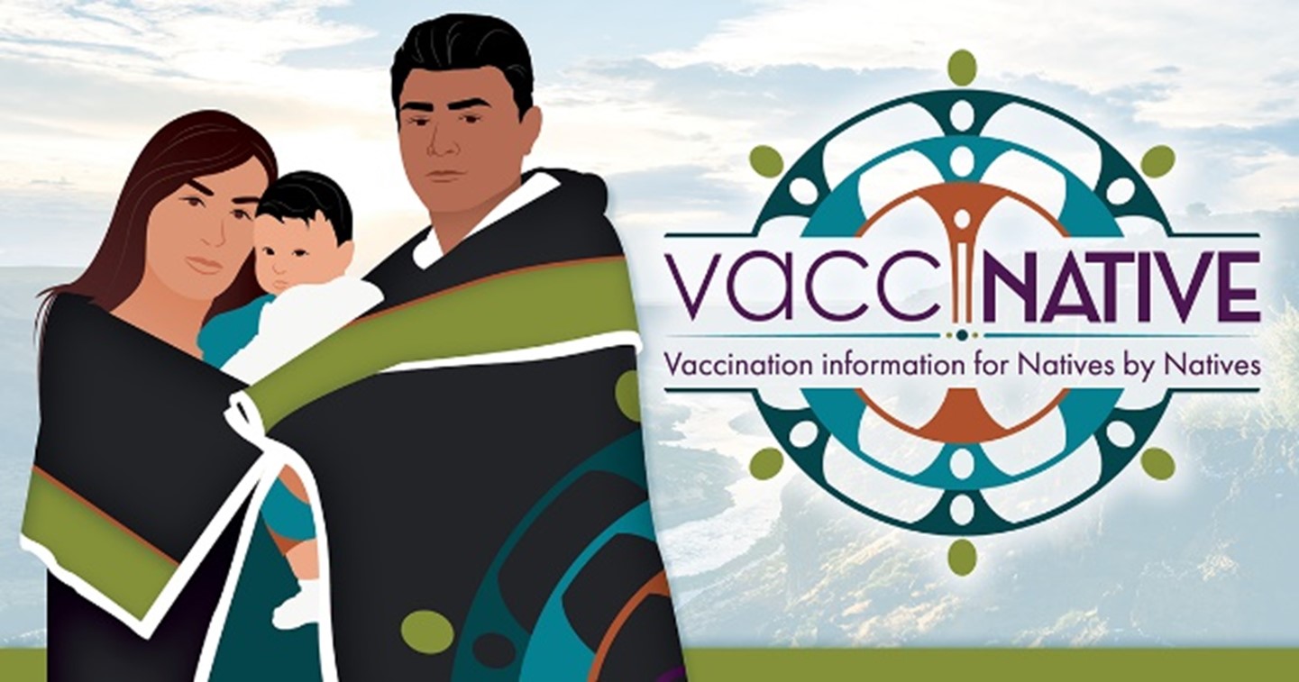 A Native mother and father wrapped in a blanket embrace and hold their newborn baby.