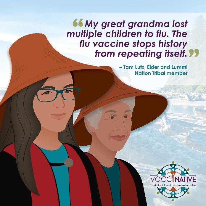 A young Native woman stands smiling and wearing a hat besides a Native elder also smiling and wearing the same hat.