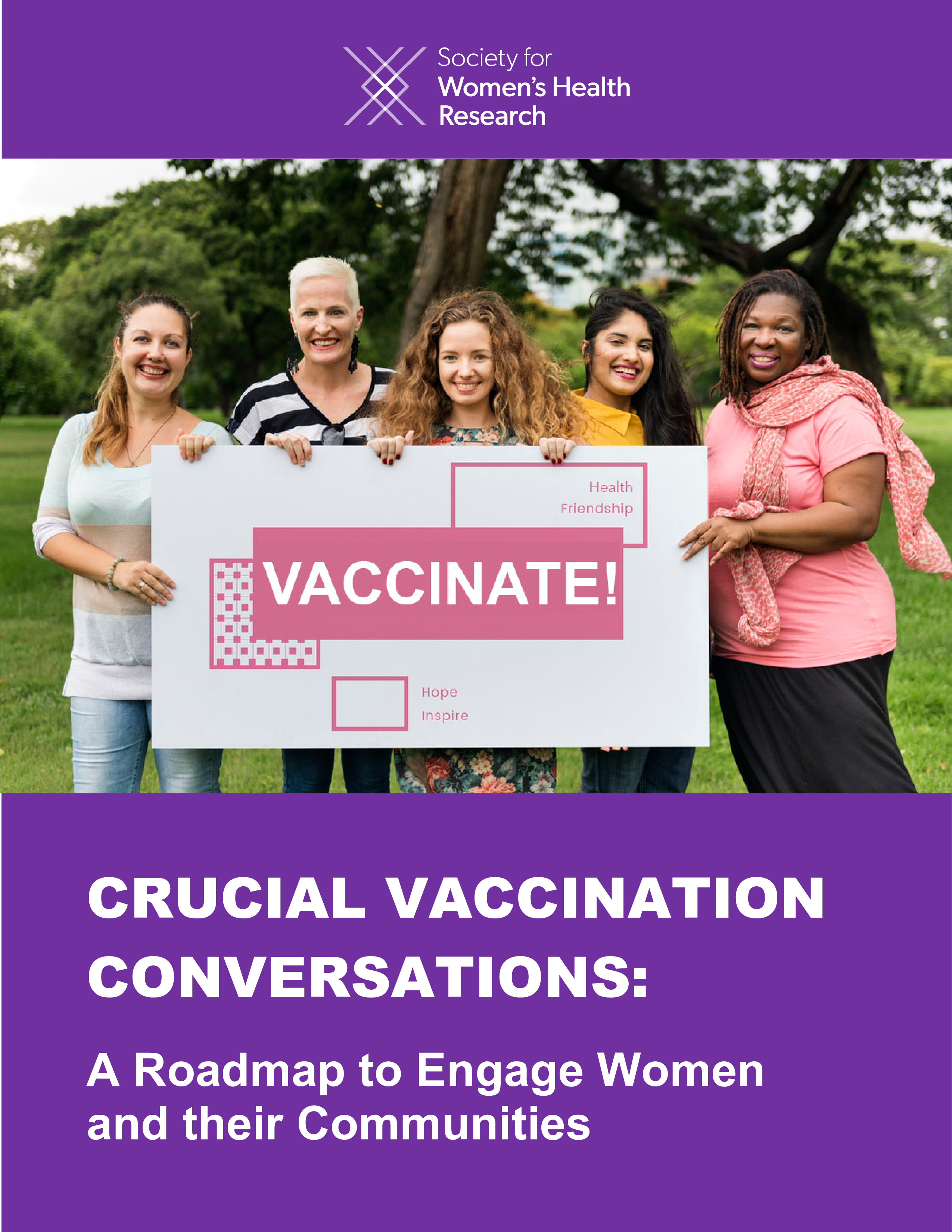A group of women smile and hold a large novelty check that says "Vaccinate!"