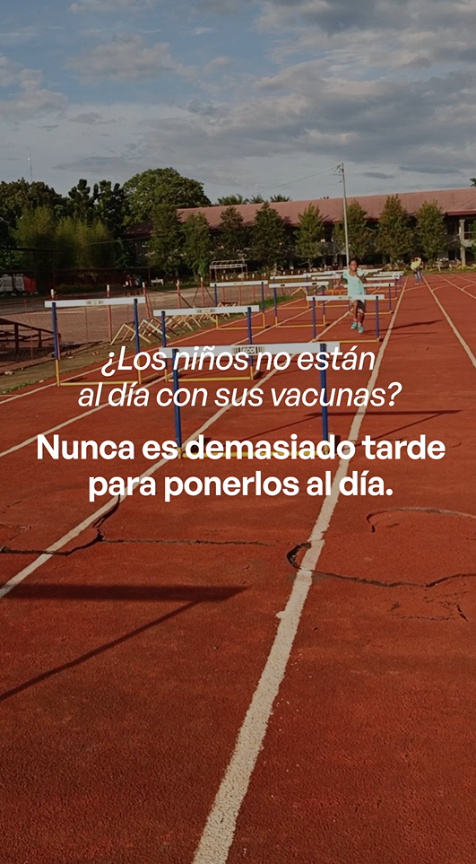 Video still shows a Black adolescent jumping hurdles on a track.