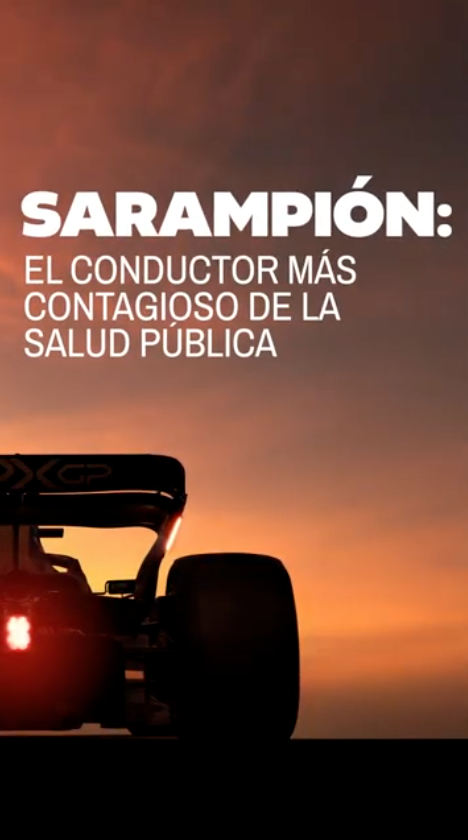 Video opens to auto racing clips and text: “Measles: Public health’s most contagious driver.” Video shows a red car racing with text: “R₀: The Contagion Grand Prix.” Other cars are shown behind the red car, with text: “R₀ = How many unprotected people can get sick from a single infected person.” The red car is labeled “Measles,” and the slower cars behind are labeled “COVID-19” and “Ebola.” Text on final frame: “Protect the whole team. Stop measles from taking the lead. Get your MMR vaccine.”