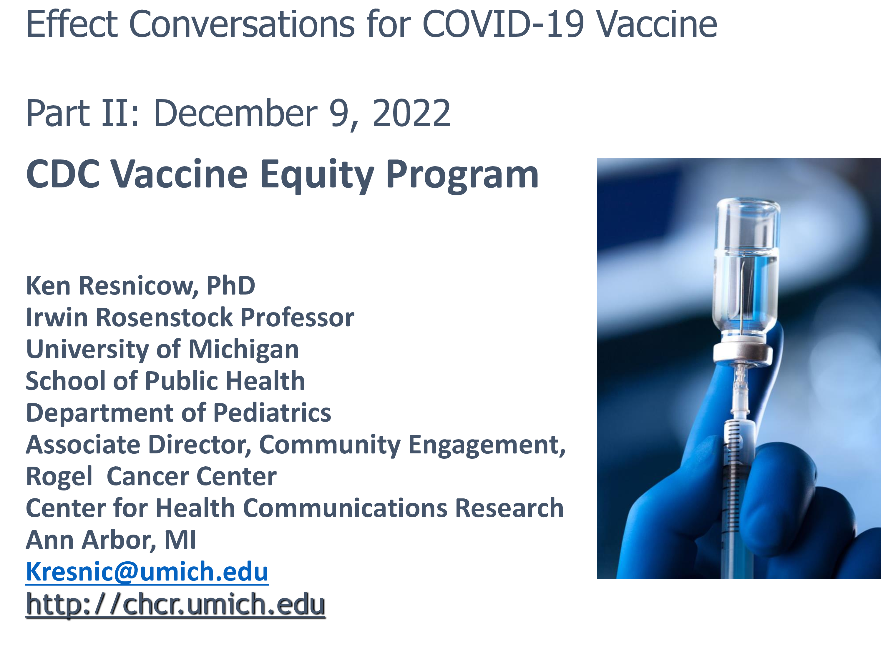 Image of gloved hands preparing a vaccine