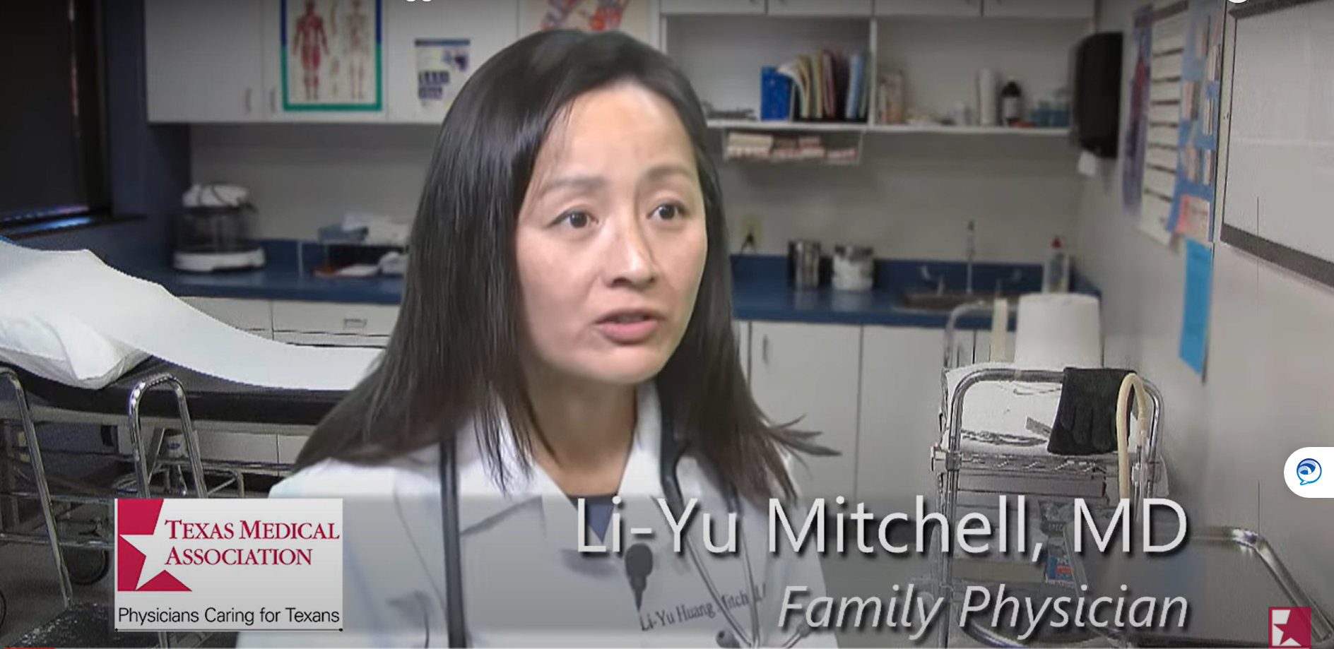 Asian doctor in an examination room