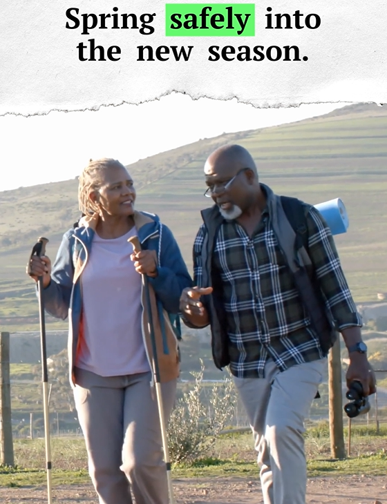 Graphic shows an older Black woman and Black man hiking. Text says: Spring safely into the new season.