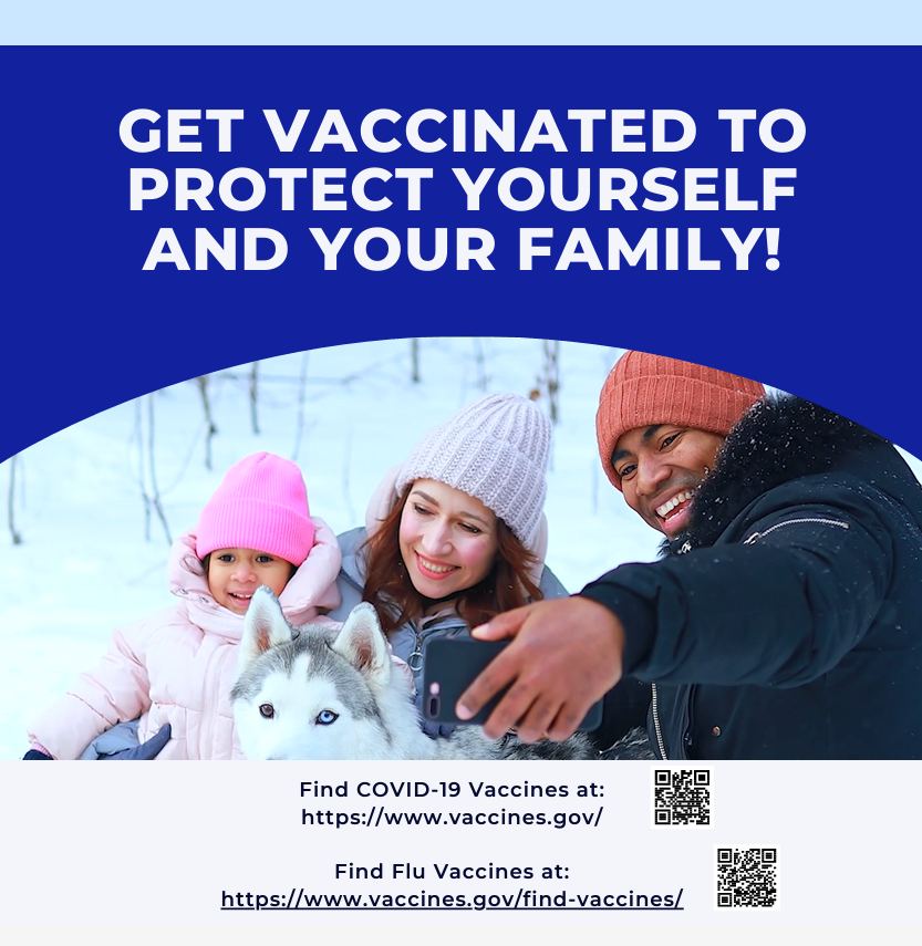 A family of three and their dog smile and pose for a selfie 