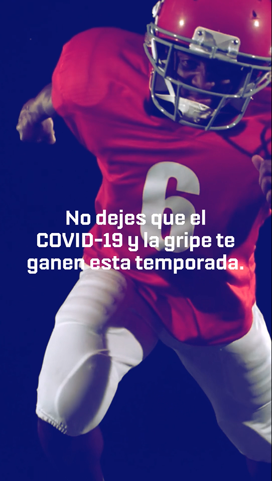 Video includes a Black man in red football gear running forward. 