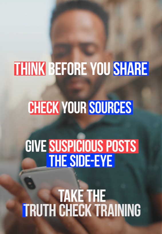 Image of a black man in a green polo shirt looking at his phone