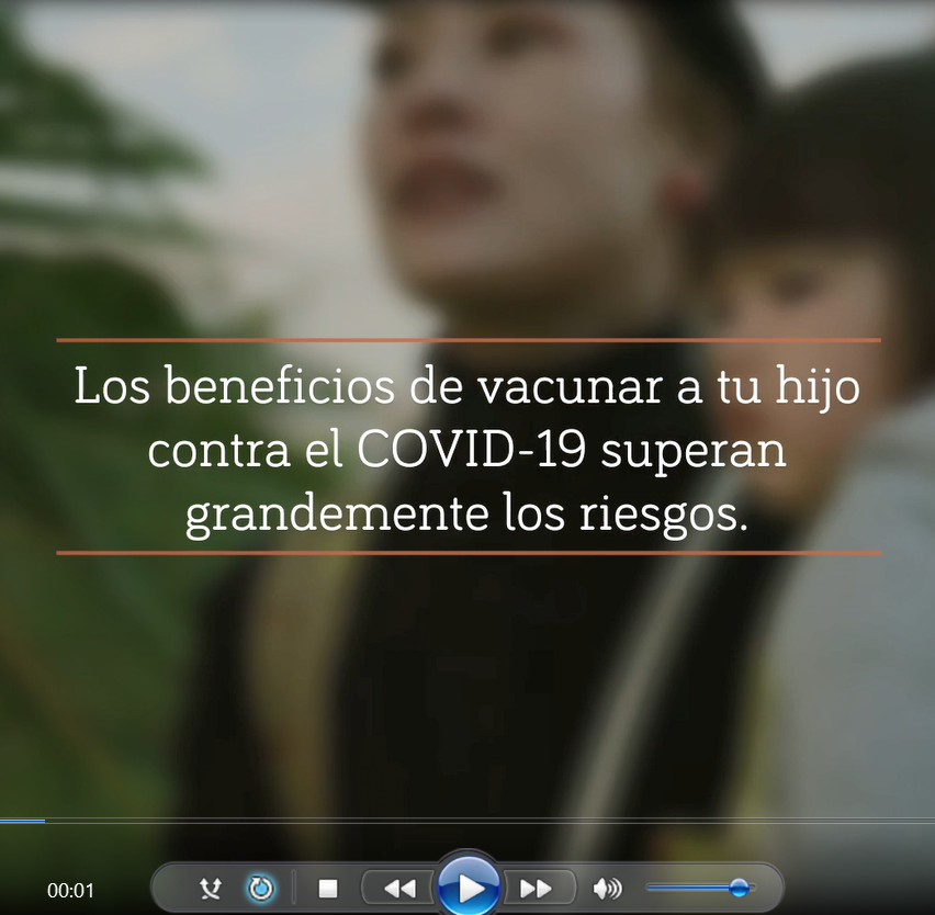 An Asian woman carries her child outside. 